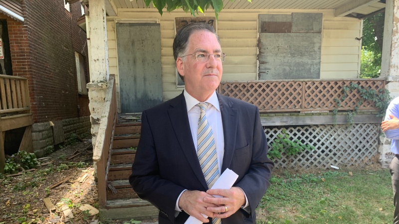 Windsor West MP Brian Masse stands in front of a boarded up home on Edison Street on Aug. 15, 2022. (Rich Garton/CTV News Windsor)