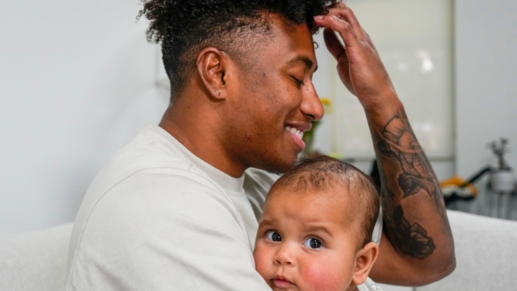 Ellia Green with his daughter 