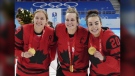 Team Canada's Brianne Jenner (19), Marie-Philip Poulin (29) and Sarah Nurse (20) celebrate with their gold medals after defeating the United States in women's hockey gold medal game action at the 2022 Winter Olympics in Beijing on Feb. 17, 2022. (THE CANADIAN PRESS/Ryan Remiorz)