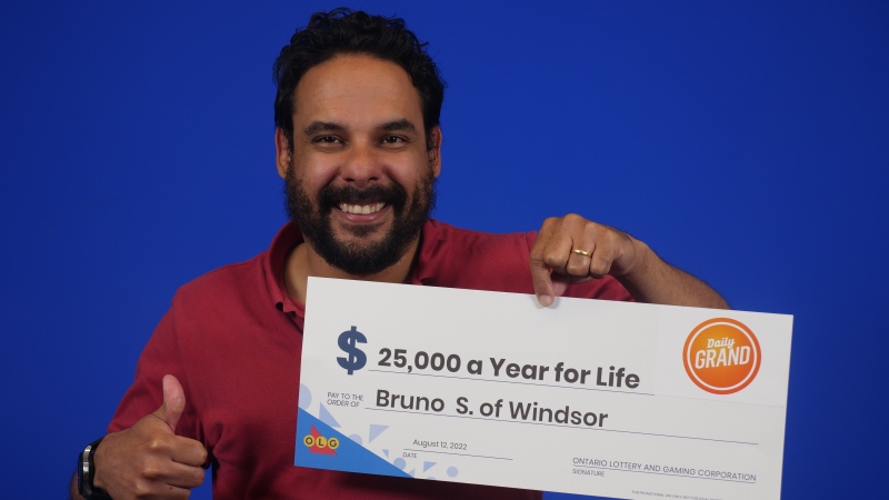 Bruno Sena Maia, 38, won $500,000 playing Daily Grand at the OLG Prize Centre in Toronto, Ont. (Courtesy OLG)