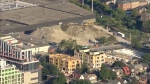 A massive dirt pile has been growing in Toronto's Stockyards District for two months and no one seems to know where it came from.
