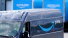An Amazon Prime logo appears on the side of a delivery van as it departs an Amazon Warehouse location in Dedham, Mass., Oct. 1, 2020. (AP Photo/Steven Senne, File)