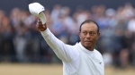 Tiger Woods of the U.S. gestures to the crowd at the end of his second round of the British Open golf championship on the Old Course at St. Andrews, Scotland, Friday July 15, 2022. (AP Photo/Peter Morrison)
