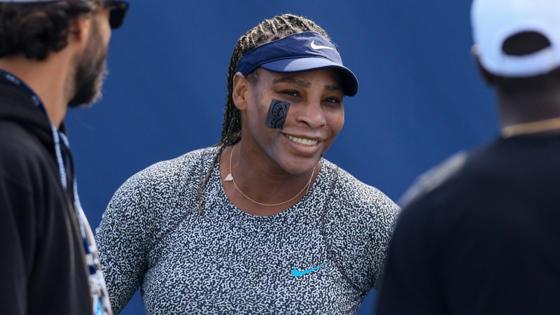 Serena Williams smiles during a practice session ahead of the Western & Southern Open tennis tournament, Monday, Aug. 15, 2022, in Mason, Ohio. (AP Photo/Aaron Doster)