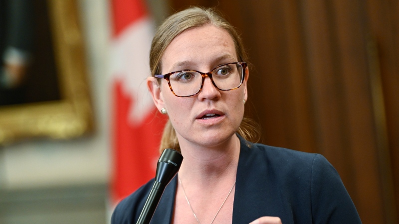 Minister of Families, Children and Social Development Karina Gould speaks to reporters before heading to Question Period in the House of Commons on Parliament Hill in Ottawa on June 23, 2022. THE CANADIAN PRESS/Justin Tang