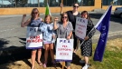 Members of the Professional Employees Association join a BCGEU picket line at the Victoria BC Liquor Distribution Branch on Aug. 16, 2022. (Professional Employees Association/Facebook)