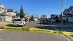 Calgary police investigate a shooting in the 100 block of Everwoods Court S.W. on Thursday, Aug. 18, 2022.