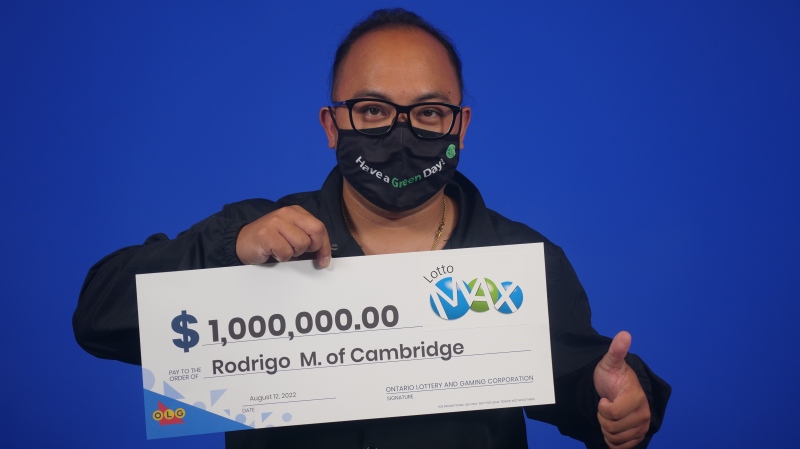 Rodrigo Maure of Cambridge with his Lotto Max winnings. (Courtesy: OLG)