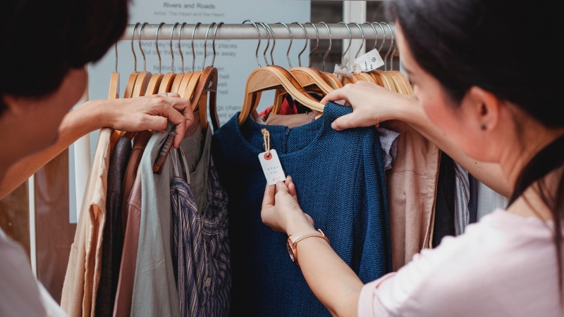 Undated photo of two people shopping. (Sam Lion/Pexels)