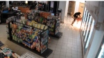 A surveillance image shared by the detachment shows sparks flying from the ATM at the back of the store. (Mission RCMP)