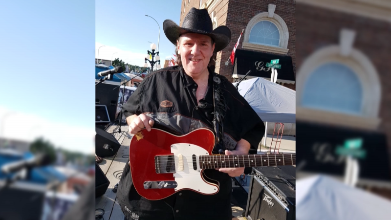 Kelly Bourdages shows off his beloved red 1964 Telecaster that Canadian country legend Big George Moody played (Supplied).