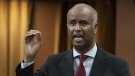FILE - Housing and Diversity and Inclusion Minister Ahmed Hussen rises during Question Period, Thursday, June 2, 2022 in Ottawa. THE CANADIAN PRESS/Adrian Wyld