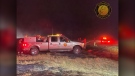 Fire rescue members at the scene of Thursday night's grassfire along the Trans-Canada Highway in southern Alberta. (Cypress County)