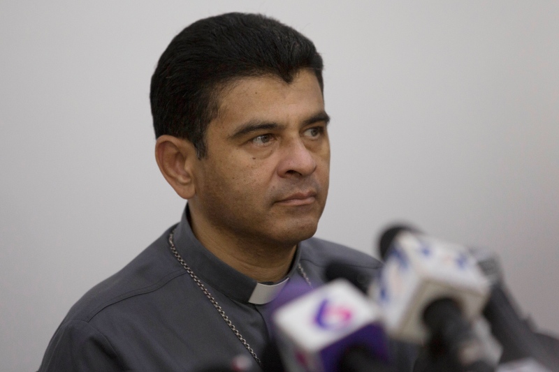 Monsignor Rolando Alvarez, bishop of Matagalpa, attends a press conference regarding the Roman Catholic Church's agreeing to act as "mediator and witness" in a national dialogue between members of civil society and the government in Managua, Nicaragua, May 3, 2018. Earlier this month Nicaragua shuttered seven radio stations belonging to the Catholic Church and launched an investigation into Alvarez, accusing him of inciting violent actors "to carry out acts of hate against the population." (AP Photo/Moises Castillo, File)