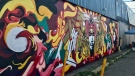 A new mural titled "Ambrosia" was painted on the side of the Bissell Centre Thrift Shoppe by local artist Soul. (Evan Klippenstein/CTV News Edmonton)