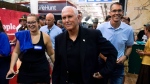 Former U.S. vice-president Mike Pence walks through the Varied Industries Building during a visit to the Iowa State Fair, Aug. 19, 2022, in Des Moines, Iowa. (AP Photo/Charlie Neibergall)