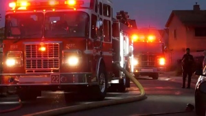Fire crews at a structure fire in northeast Calgary Friday night