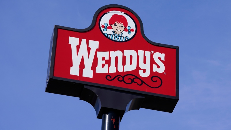 This Thursday, Feb. 25, 2021, photo shows a sign over a Wendy's restaurant in Des Moines, Iowa. (AP Photo/Charlie Neibergall, File)