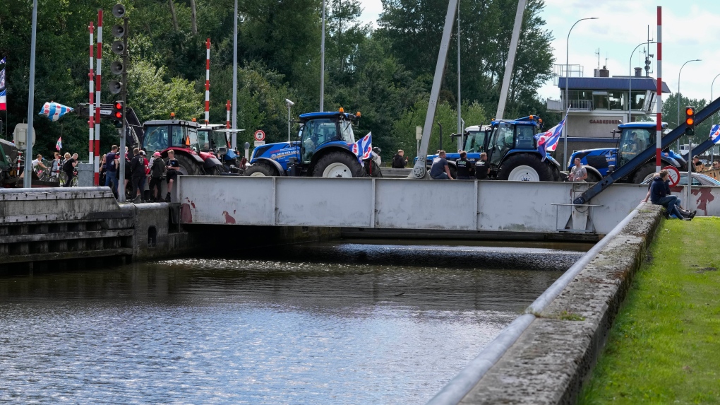 Dutch farmers block a draw bridge in protest