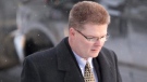 Saskatchewan Roughriders general manager Eric Tillman arrives to the Provincial Courthouse on Monday, Jan. 4, 2010 in Regina, Sask. Tillman is on trail for an alleged sexual assault charge against a teenage girl. (THE CANADIAN PRESS/Troy Fleece)
