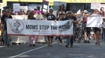 Advocates march from the Johnson Street Bridge to the provincial health building in downtown Victoria on International Overdose Awareness Day. Aug. 31, 2022. (CTV News)