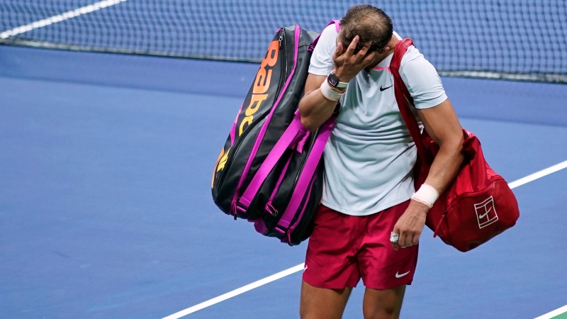 Rafael Nadal, of Spain, walks off the court after a loss to Frances Tiafoe, of the United States, during the fourth round of the U.S. Open tennis championships, Monday, Sept. 5, 2022, in New York. (AP Photo/Eduardo Munoz Alvarez)