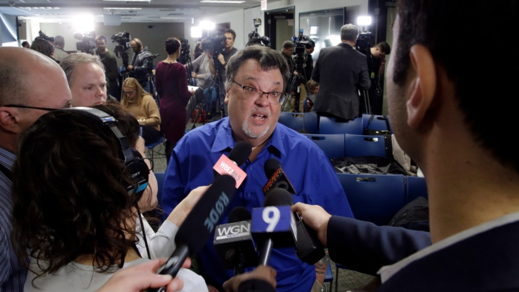 Jim DeRogatis talks to reporters in 2019