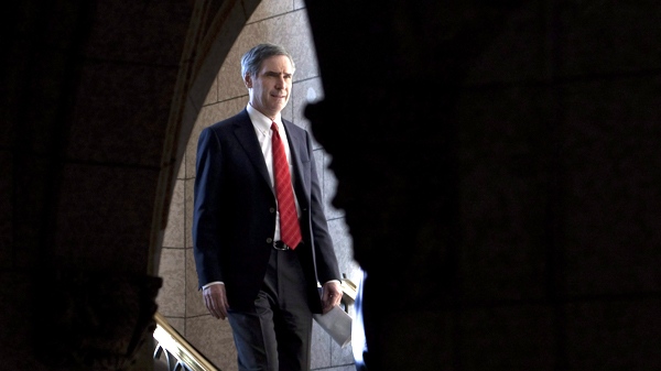 Liberal Leader Michael Ignatieff makes his way to a news conference on Parliament Hill in Ottawa, on Friday December 18, 2009. (Adrian Wyld / THE CANADIAN PRESS)