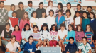 U.K. Prime Minister Liz Truss (second row from top, second from left) is seen in a photo she posted to Instagram on July 1, 2018, showing her with classmates from grade 6 and 7 at Parkcrest Elementary School, in Burnaby, British Columbia. Truss spent 1987-1988 at Parkcrest. THE CANADIAN PRESS/HO-Instagram/Liz Truss