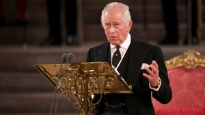 King Charles III speaks at Westminster Hall, where both Houses of Parliament are meeting to express their condolences following the death of Queen Elizabeth II, at Westminster Hall, in London, Monday, Sept. 12, 2022. (Henry Nicholls/Pool Photo via AP)