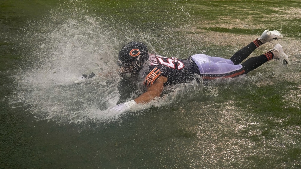 Chicago Bears' Sterling Weatherford in a puddle