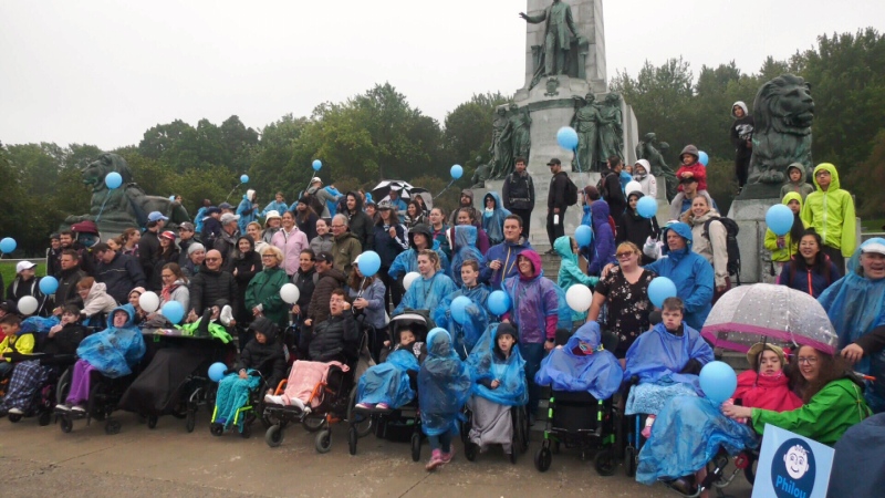 Children with multiple disabilities and their parents travelled up Mount Royal on Sept. 18, 2022 to raise awareness. (CTV Montreal/Billy Shields) 