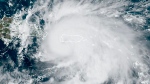 This satellite image provided by NOAA shows Hurricane Fiona in the Caribbean on Sunday, Sept. 18, 2022.  (NOAA via AP)