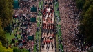 The Ceremonial Procession of the coffin of Queen Elizabeth II travels down the Long Walk as it arrives at Windsor Castle for the Committal Service at St George's Chapel, in Windsor, England, Monday, Sept. 19, 2022. (Aaron Chown/Pool photo via AP)