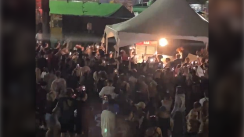 A crowd forms around a food kiosk at Breakout Festival in Vancouver on Sept. 18, 2022. Vancouver police said there was thousands of dollars in property damage to the venue after Lil Baby couldn't perform. (@mc1040597/Twitter)