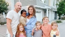 Vanessa van Tol and her husband Jordan pose for a photo with their children Malaya, 6, baby Reamohetse, Maverick, 8, Cruz, 10, and Roan, 8, in this undated handout photo. THE CANADIAN PRESS/HO