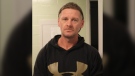 Andrew Scott Barker is described as five-foot-ten, 150 pounds, with dark brown hair and green eyes. (SOURCE: RCMP)