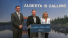 Alberta Premier Jason Kenney poses for a picture with MLAs R.J. Sigurdson, left, and Miranda Rosin, right, at a transit station at Yonge and Dundas in Toronto on Sept. 21, 2022, after launching the second phase of his government's "Alberta is Calling" campaign to draw workers to the province.