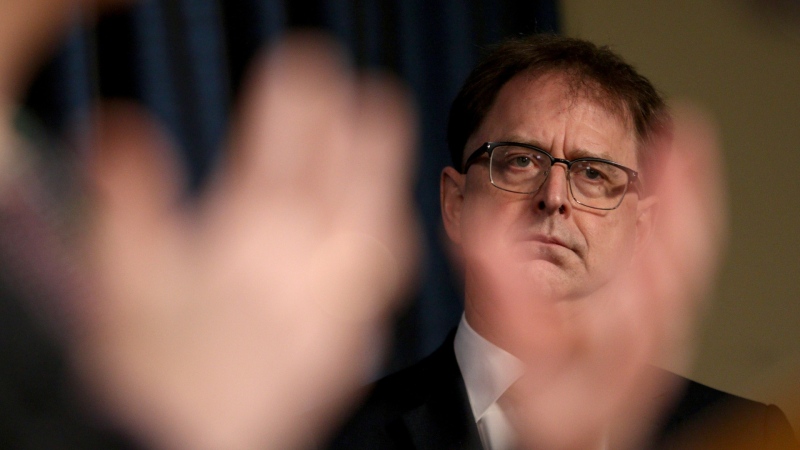 (File) Health Minister Adrian Dix is seen during a COVID-19 news conference in Victoria, B.C., on Thursday, March 10, 2022. THE CANADIAN PRESS/Chad Hipolito