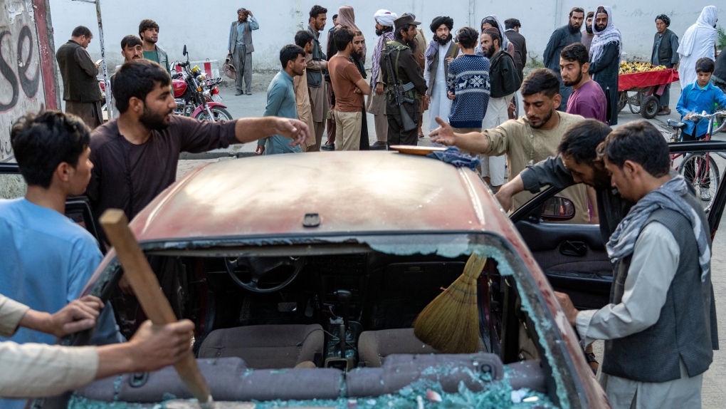 Car damaged from explosion in Afghanistan