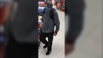 The suspect is described as six feet tall. He was wearing a light grey cloth face covering, dark clothing, and was carrying two black backpacks at the time of the incident.  (SOURCE: RCMP)