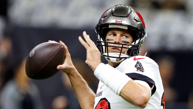 Tampa Bay Buccaneers quarterback Tom Brady warms up before the first half of an NFL football game against New Orleans Saints in New Orleans, Sunday, Sept. 18, 2022.  (AP Photo/Butch Dill, File)
