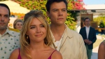 This image released by Warner Bros. Entertainment shows Florence Pugh, left, and Harry Styles in a scene from "Don't Worry Darling." (Warner Bros. Entertainment via AP)