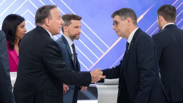 CAQ Leader Francois Legault, left, shakes hands with Quebec Conservative Leader Eric Duhaime following a leaders debate in Montreal, Thursday, September 22, 2022. Quebecers will go to the polls on October 3rd. THE CANADIAN PRESS/Ryan Remiorz