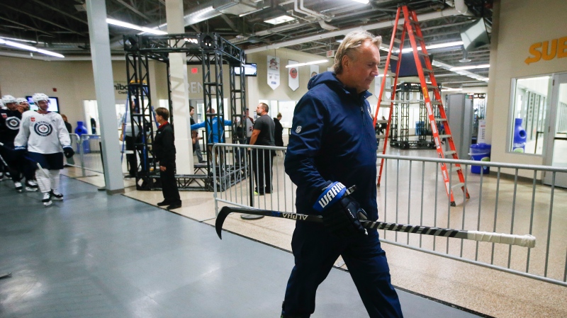 Winnipeg Jets new head coach Rick Bowness leads his team to the rink during opening day of their NHL training camp practice in Winnipeg, Thursday, Sept. 22, 2022. THE CANADIAN PRESS/John Woods