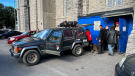 People packing up a vehicle outside St. Brigid's church in Lowertown after a judge ordered the eviction of The United People of Canada on Friday, Sept. 23, 2022. (Jeremie Charron/CTV News Ottawa)