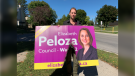 Candidate Elizabeth Peloza with a campaign sign that was vandalized in London, Ont. on Friday, Sept. 23, 2022. (Bryan Bicknell/CTV News London)