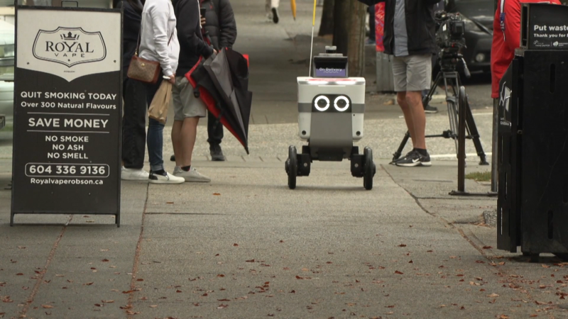 A Pizza Hut delivery robot is seen on Robson Street in downtown Vancouver on Sept. 23, 2022. 