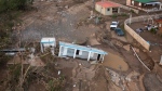 A house lays in the mud after it was washed away by Hurricane Fiona at Villa Esperanza in Salinas, Puerto Rico, Wednesday, Sept. 21, 2022. (AP Photo/Alejandro Granadillo)