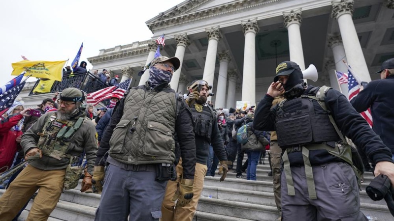 FILE - Members of the Oath Keepers stand on the East Front of the U.S. Capitol on Jan. 6, 2021, in Washington. (AP Photo/Manuel Balce Ceneta, File)